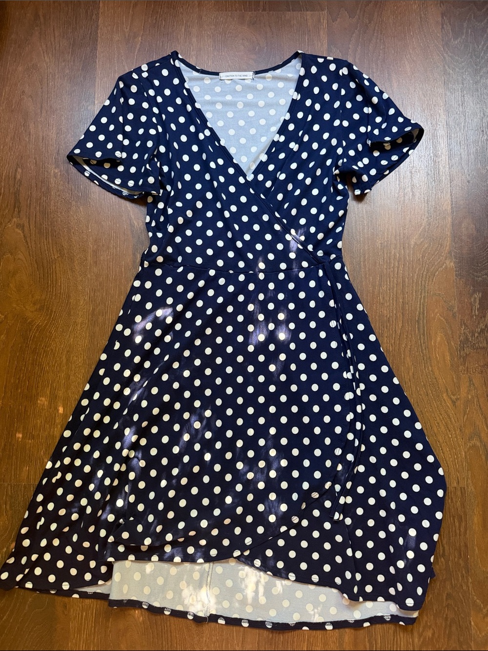 Caution To The Wind Navy and White Polka Dot Wrap Dress